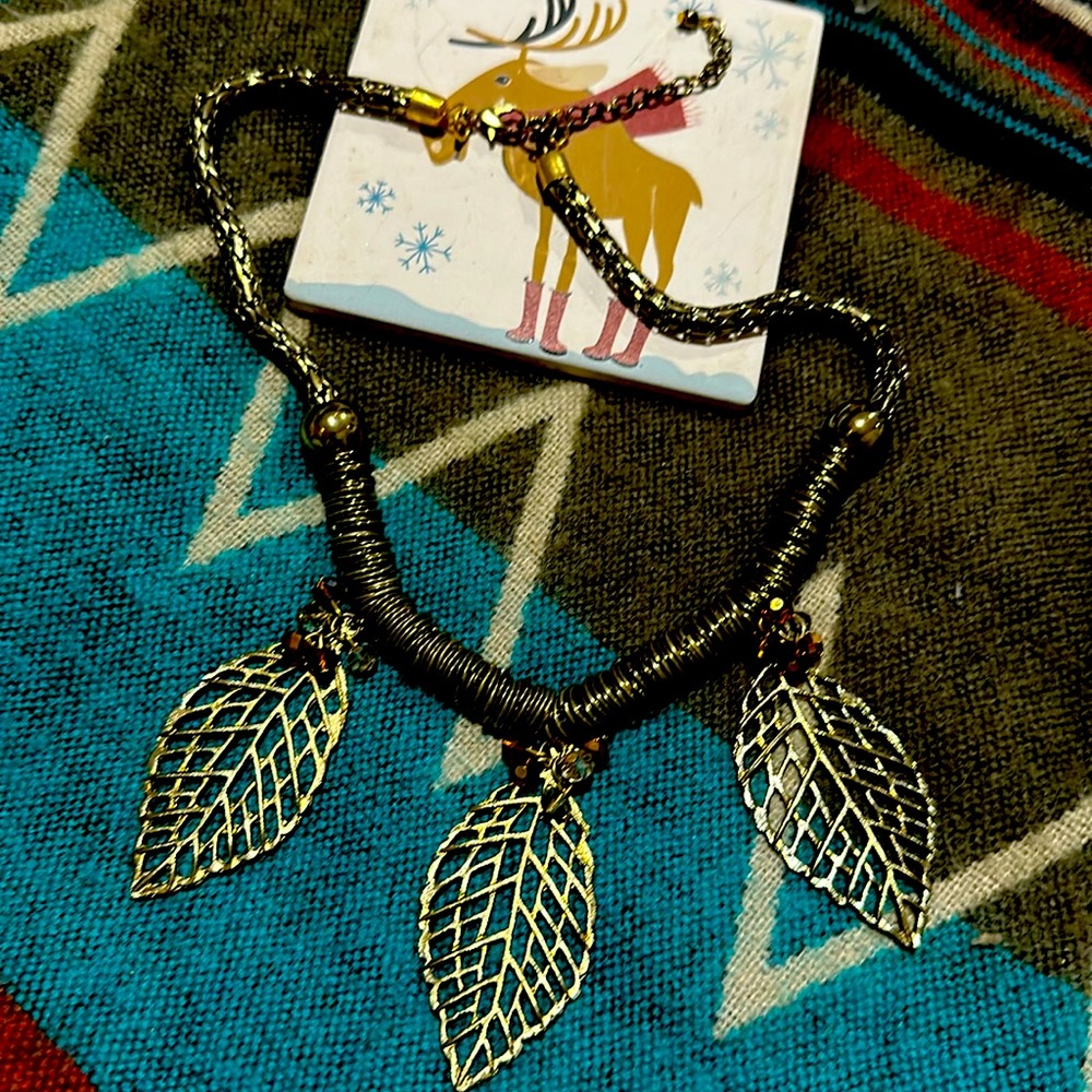 Statement necklace brass tone wire leaves cluster beads amber tones brutalist
